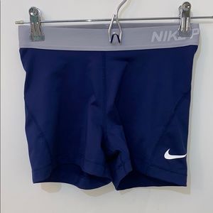 Blue and grey nike pros